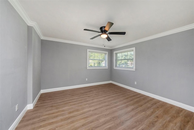 unfurnished room with light hardwood / wood-style flooring, ceiling fan, and ornamental molding