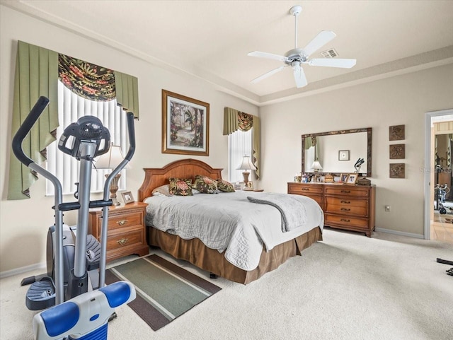 bedroom with ceiling fan and carpet floors