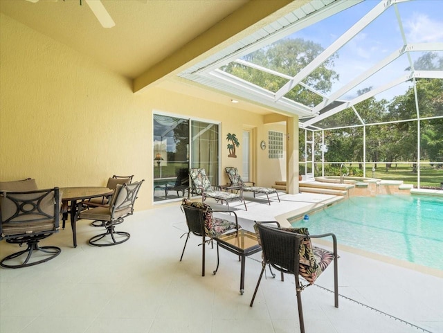 exterior space with a lanai and a patio