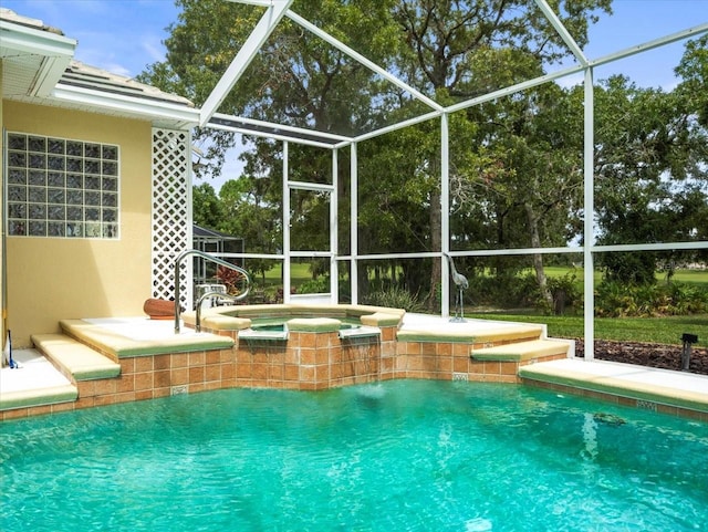 view of pool with glass enclosure and an in ground hot tub