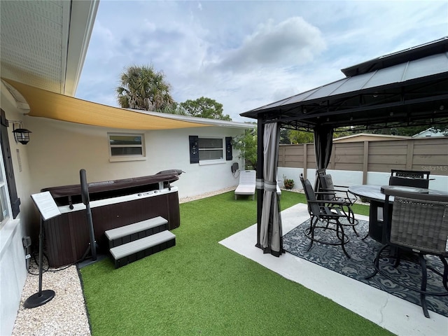 view of yard featuring a patio and a gazebo