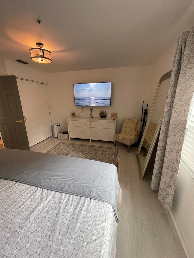 bedroom featuring light hardwood / wood-style flooring