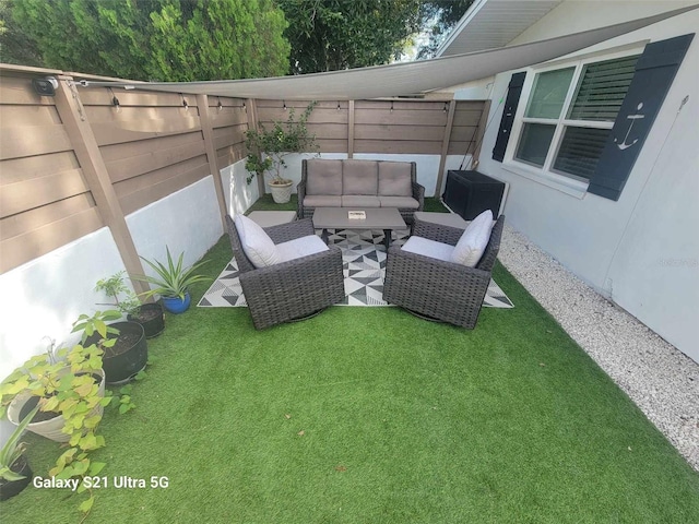 exterior space with an outdoor living space and a patio area