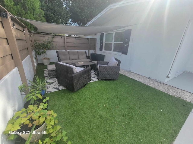 view of yard featuring an outdoor living space and a patio