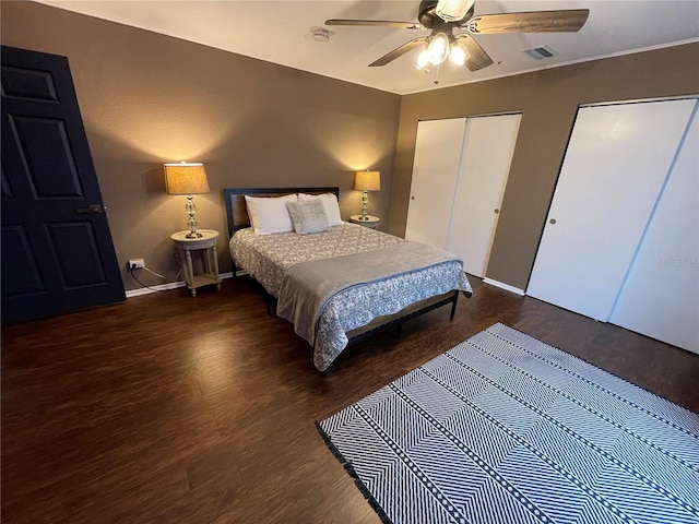 bedroom featuring ceiling fan and dark hardwood / wood-style floors