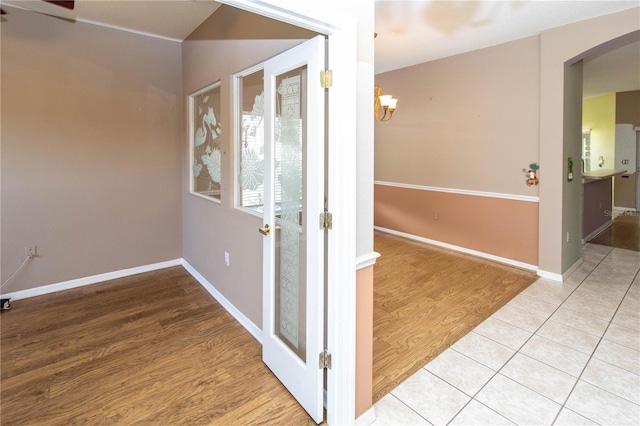 interior space featuring light hardwood / wood-style floors and ceiling fan