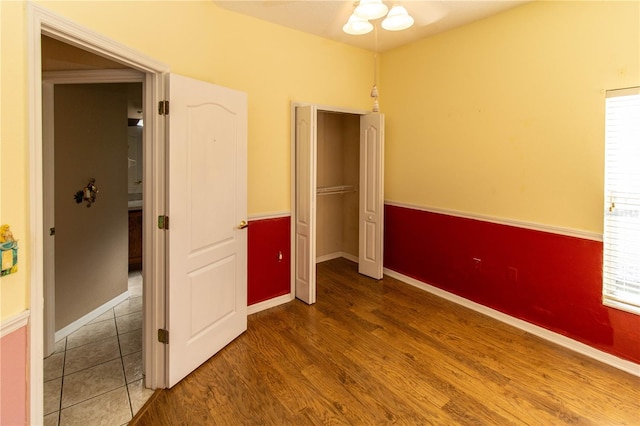 unfurnished bedroom featuring hardwood / wood-style floors