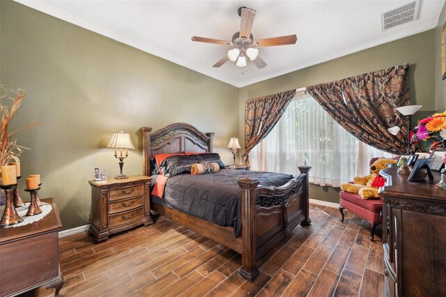 bedroom featuring wood-type flooring and ceiling fan