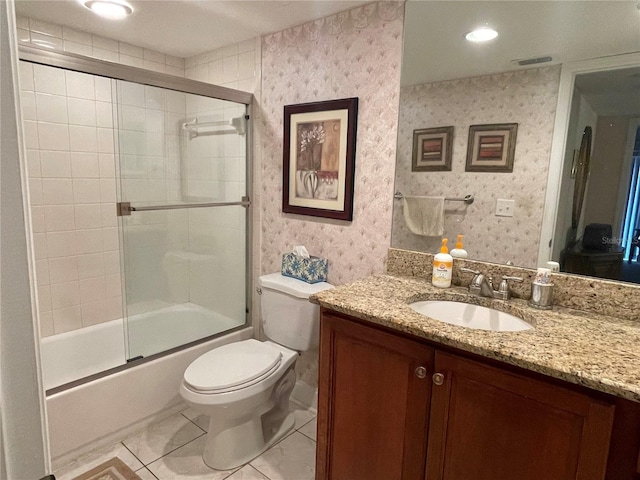 full bathroom with vanity, tile patterned flooring, toilet, and combined bath / shower with glass door