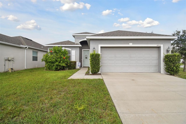 ranch-style house with a garage and a front lawn