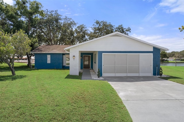 single story home with a garage and a front lawn