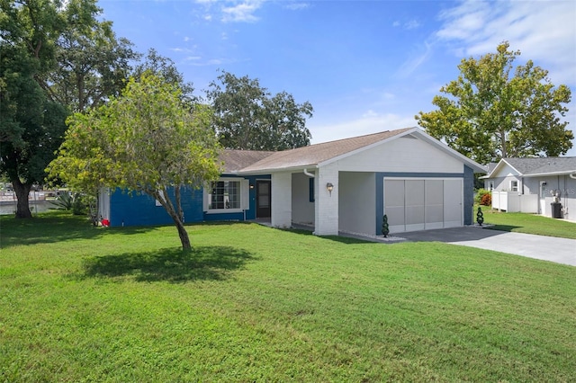 single story home with a front lawn and a garage