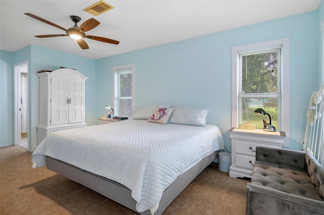 bedroom featuring ceiling fan