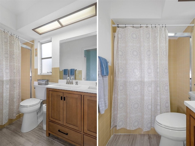 bathroom featuring tile walls, hardwood / wood-style floors, vanity, and toilet