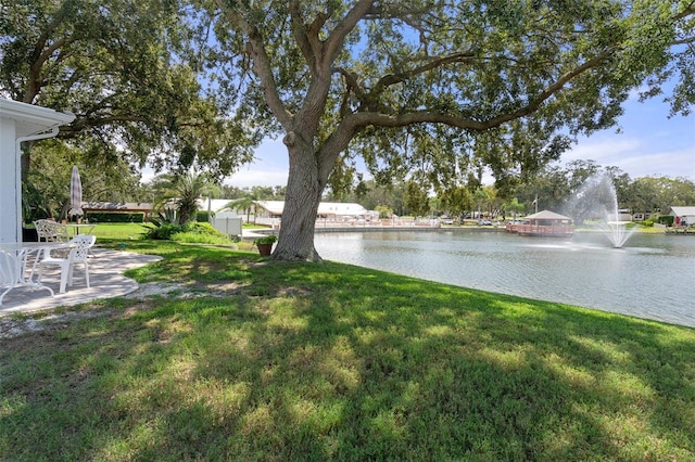 exterior space with a water view