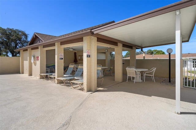 view of patio / terrace featuring ceiling fan