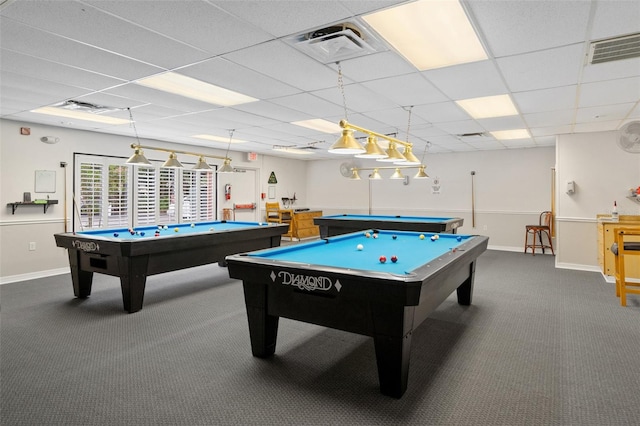 recreation room with a paneled ceiling, pool table, and carpet