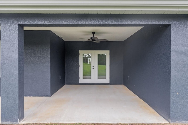 property entrance with ceiling fan, a patio area, and french doors