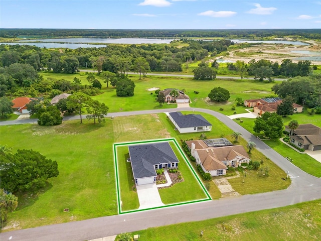 bird's eye view with a water view