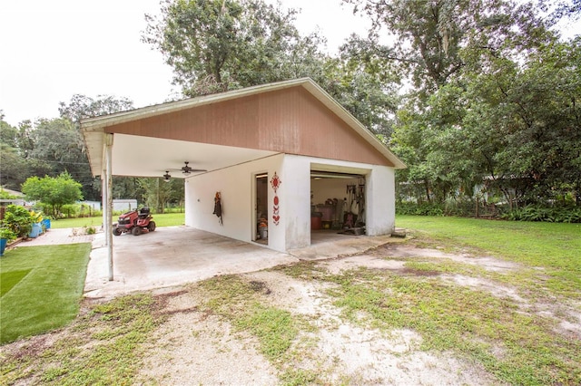 garage with a yard