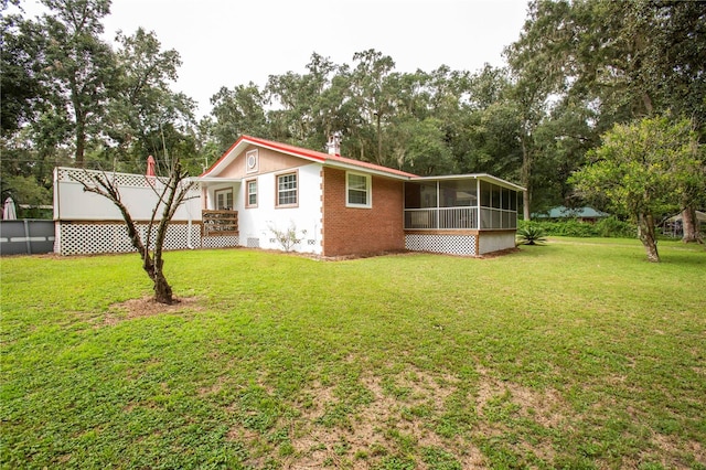 exterior space featuring a sunroom