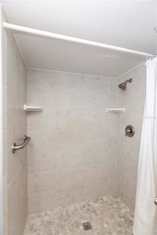 bathroom with a stall shower