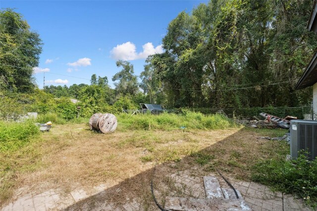 365 S Snapp Ave, Inverness, FL 34453 - view of yard featuring central air condition unit