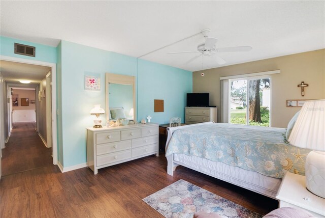 bedroom featuring dark hardwood / wood-style floors and ceiling fan