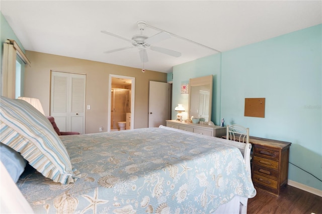 bedroom featuring dark hardwood / wood-style floors, ceiling fan, ensuite bathroom, and a closet