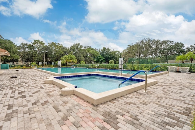 view of pool with a patio area