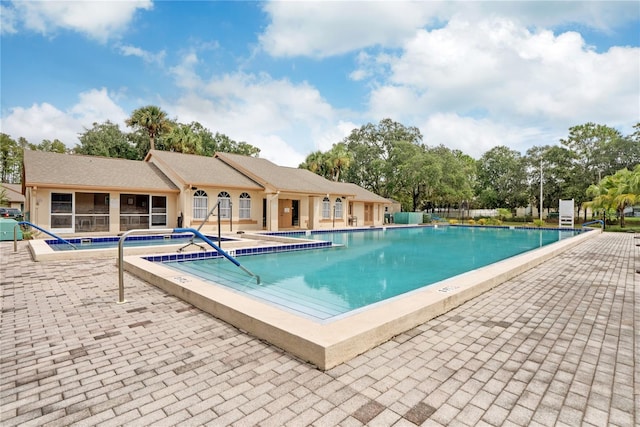 view of swimming pool featuring a patio