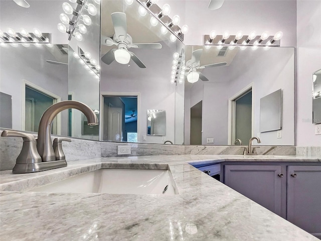 bathroom with vanity and ceiling fan