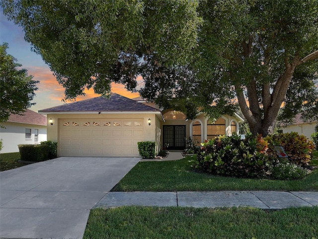 view of front of property with a garage