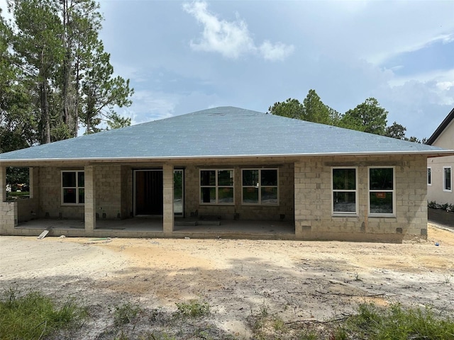 rear view of house featuring a patio area