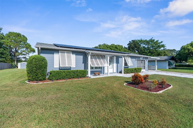 ranch-style house with a front lawn and a garage