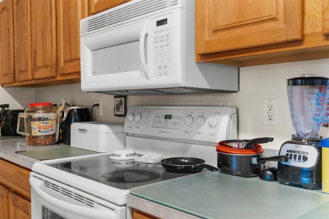 kitchen featuring white appliances