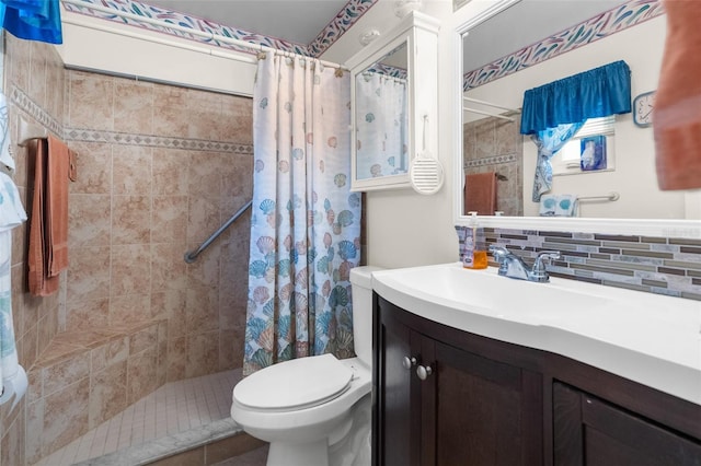 bathroom featuring backsplash, a shower with curtain, vanity, and toilet