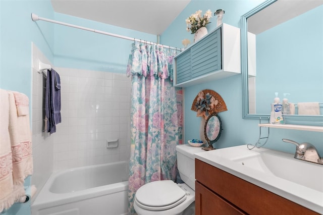 full bathroom featuring vanity, toilet, and shower / bathtub combination with curtain