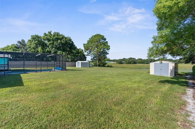 view of yard with a storage unit