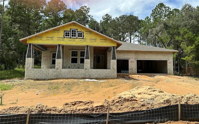 property under construction with covered porch