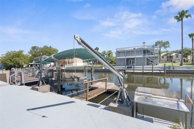 view of dock with a water view