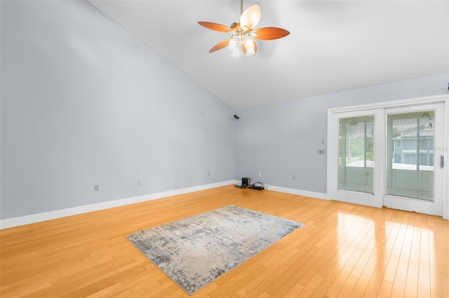 interior space with high vaulted ceiling, ceiling fan, and hardwood / wood-style flooring