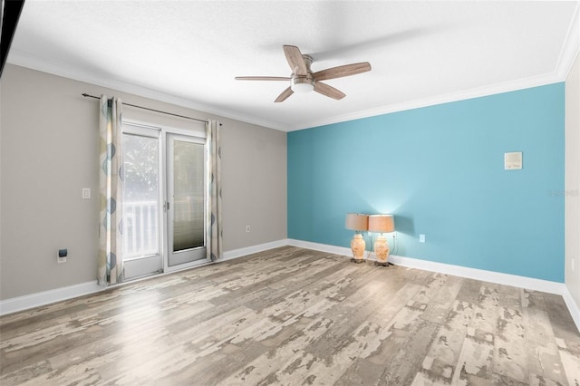 unfurnished room with ceiling fan, light wood-type flooring, and ornamental molding