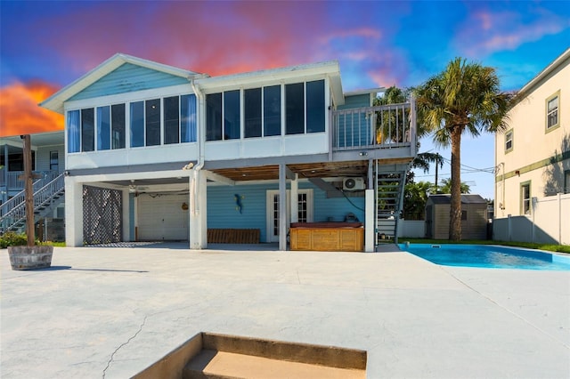 view of front of home with a sunroom