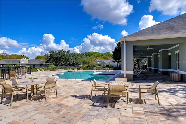 view of pool featuring a patio area and ceiling fan