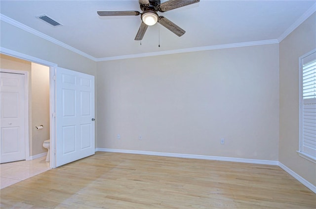 unfurnished room featuring crown molding, ceiling fan, and light wood-type flooring