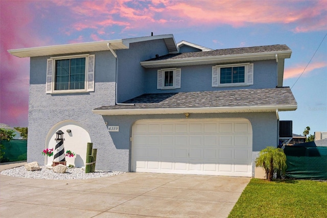 view of front of house with a garage