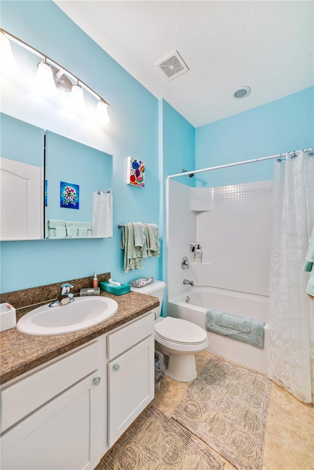 full bathroom featuring vanity, toilet, and shower / tub combo