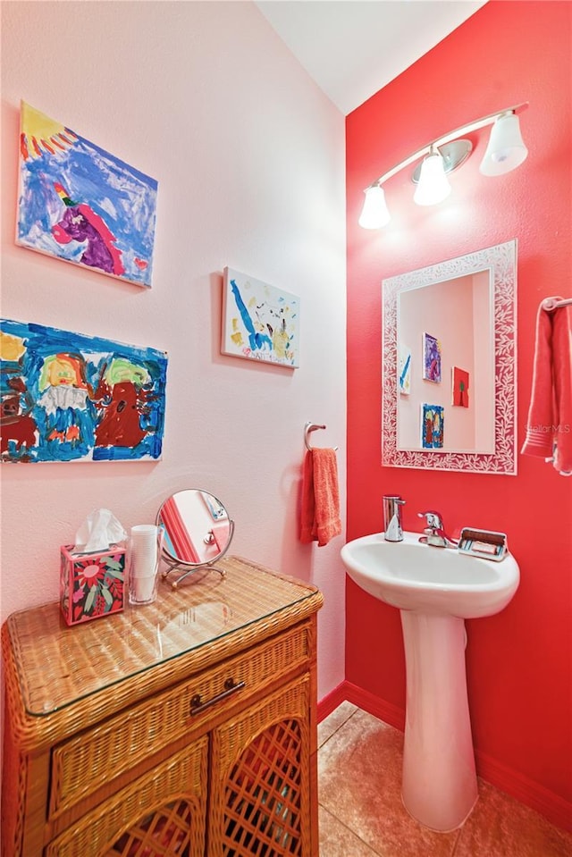 bathroom featuring tile patterned floors and sink