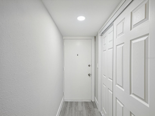 entryway with light hardwood / wood-style flooring